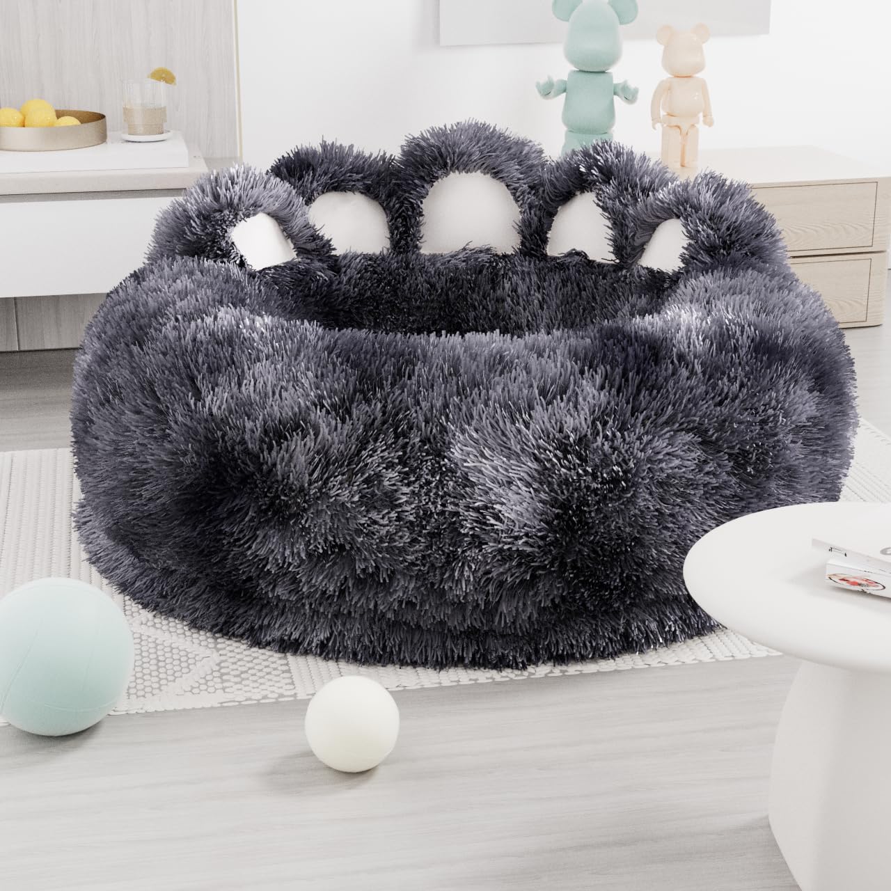 Fluffy gray pet bed with plush texture in a room setting.